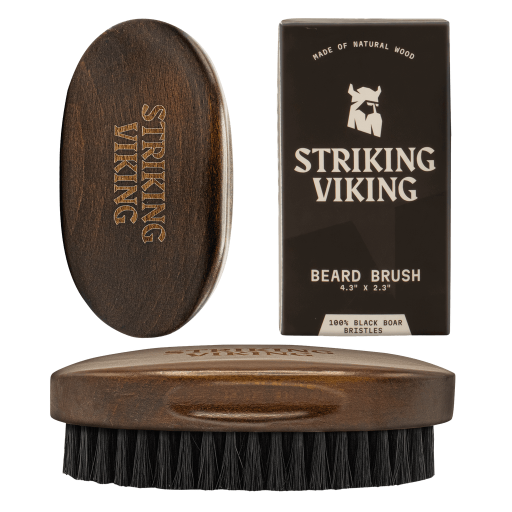 Wooden beard brush with 'Striking Viking' branding on a black background
