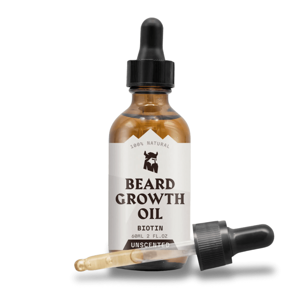 Beard growth oil bottle with dropper on a white background