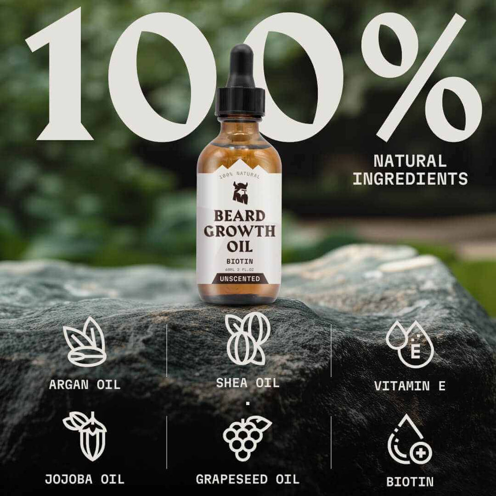 Bottle of beard growth oil on a rock with natural ingredients listed