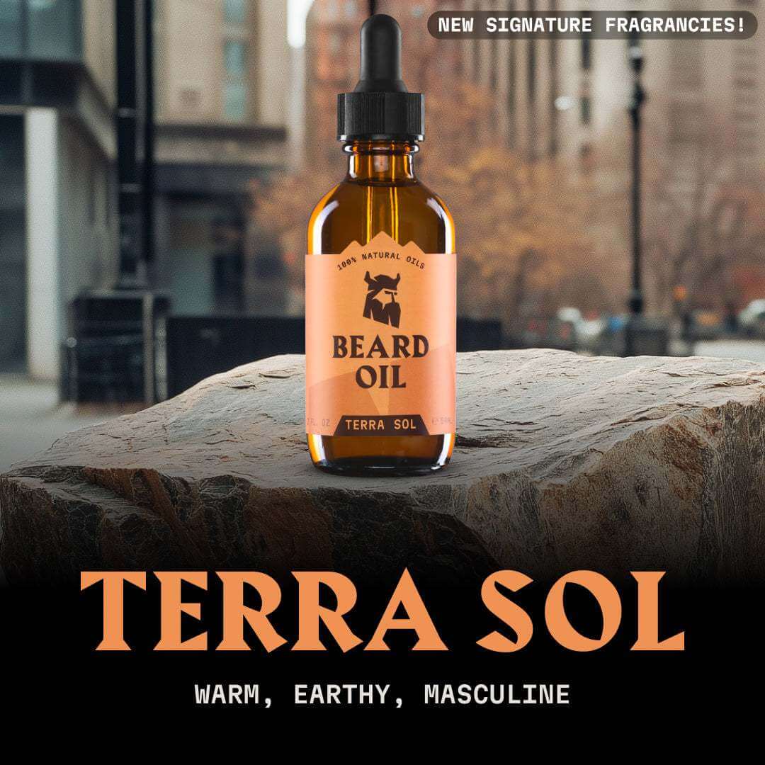 Terra Sol beard oil bottle on a rock with a blurred cityscape background