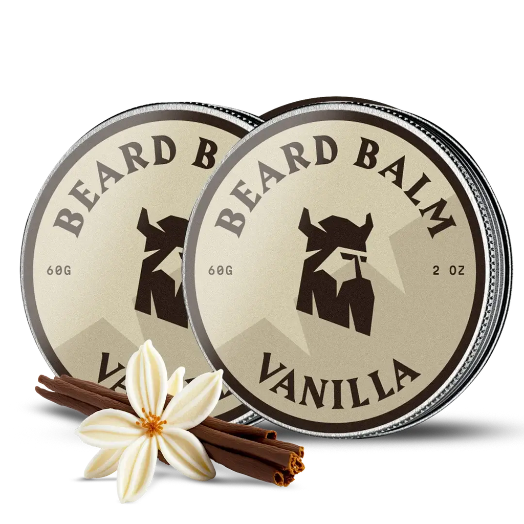 Two tins of vanilla beard balm with a vanilla flower and cinnamon stick on a white background