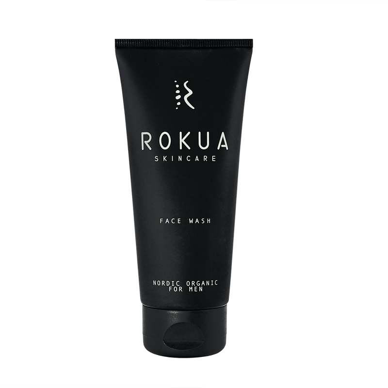Black tube of ROKUA Skincare Face Wash on a transparent background